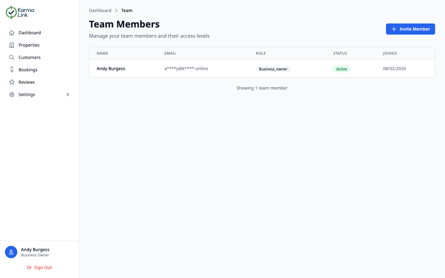 KarmaLink team members page showing a table of team members with their roles and status